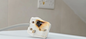 A plug with fire damage. How to prevent electrical fires by Heritage Emergency Electrician