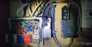 A consumer unit damaged by electrical fire at a property in Oakhampton Devon